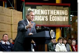 President George W. Bush talks with owners and employees of JS Logistics in St. Louis, Mo., about his economic stimulus package Wednesday, Jan. 22, 2003. White House photo by Paul Morse.