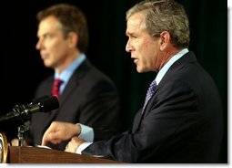 President George W. Bush and British Prime Minister Tony Blair conduct a joint news conference at Camp David concerning the war in Iraq Thursday, March 27, 2003. White House photo by Paul Morse