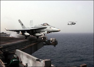 The Arabian Gulf (Mar. 20, 2003) -- An F/A-18C Hornet assigned to the Stingers of Strike Fighter Squadron One One Three (VFA 113) launches from the flight deck aboard the aircraft carrier USS Abraham Lincoln (CVN 72).U.S. Navy photo by Photographer's Mate 3rd Class Philip A. McDaniel 